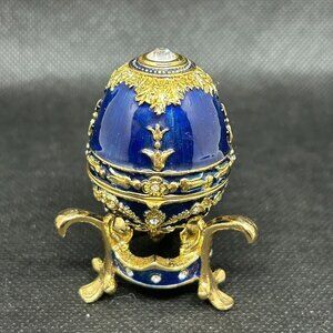 Enameled egg with stand